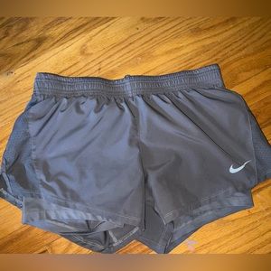 Nike womens Dri-Fit shorts Grey with drawstring in size Medium